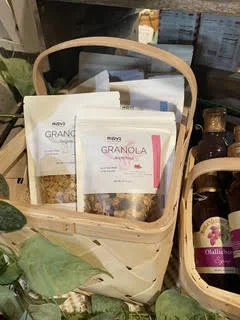 Mary's All Natural granola pouches displayed in a market basket.